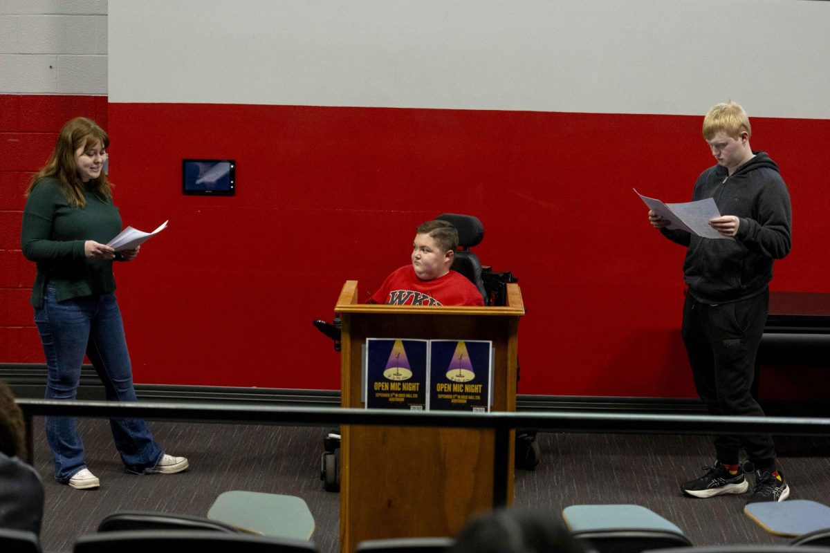 Western Kentucky University sophomore Noah Payton (middle) acts out a screen play with two classmates at the Department of English’s Open Mic Night on Thursday, Feb. 26, 2026 in Grise Hall.