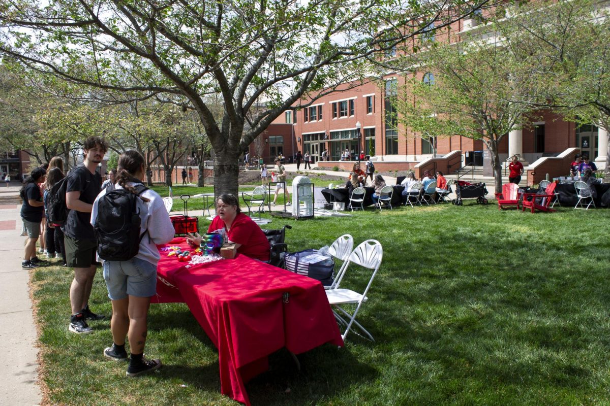 (Left to right) Freshman nursing major Malici Colburn and sophomore accounting major Reagan Abbot learn about the WKU Counseling Center from mental health therapist Elizabeth Madariaga. The WKU Counseling Center offers free counseling services to students. 