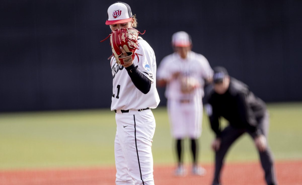 Western Kentucky Hilltoppers Right Hand Pitcher Gage Olsen (21) prepares to pitch the ball during WKU’s game against the Cincinnati Bearcats at Nick Denes Field on Tuesday, March 3, 2026.