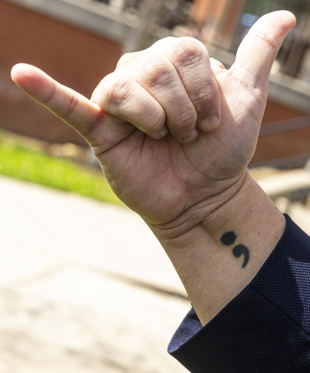 The semicolon has become a symbol amongst mental health advocates, representing a decision to move forward and continue living despite the circumstances. 