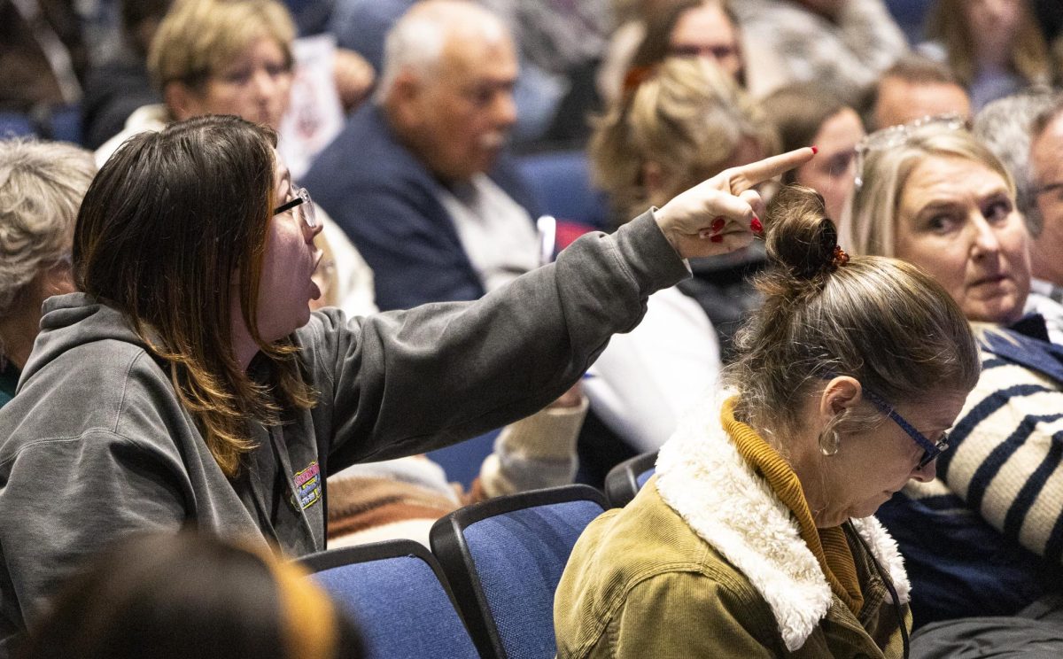 Franklin resident Jasmine Butt protested preliminary data center plans during a Franklin Kentucky Planning and Zoning Commission meeting on Thursday, Feb. 5, 2026 in Franklin-Simpson High School. 