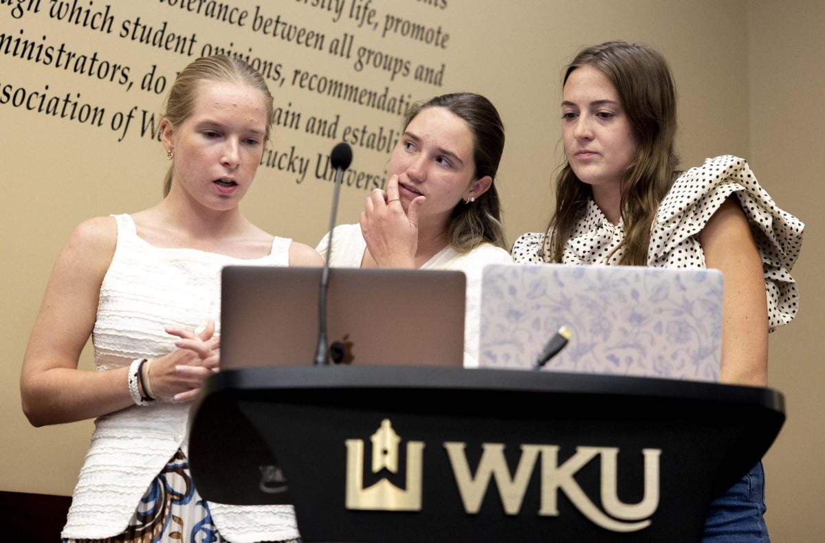 (from left) Senators Molly Ricke, Gabi Pace and Julianna Mitchell present the “Fuel Up For Finals” bill during the weekly SGA meeting on Thursday, April 2, 2026 in Senate Chambers. The bill would allocate funding for a tabling event during finals week. 
