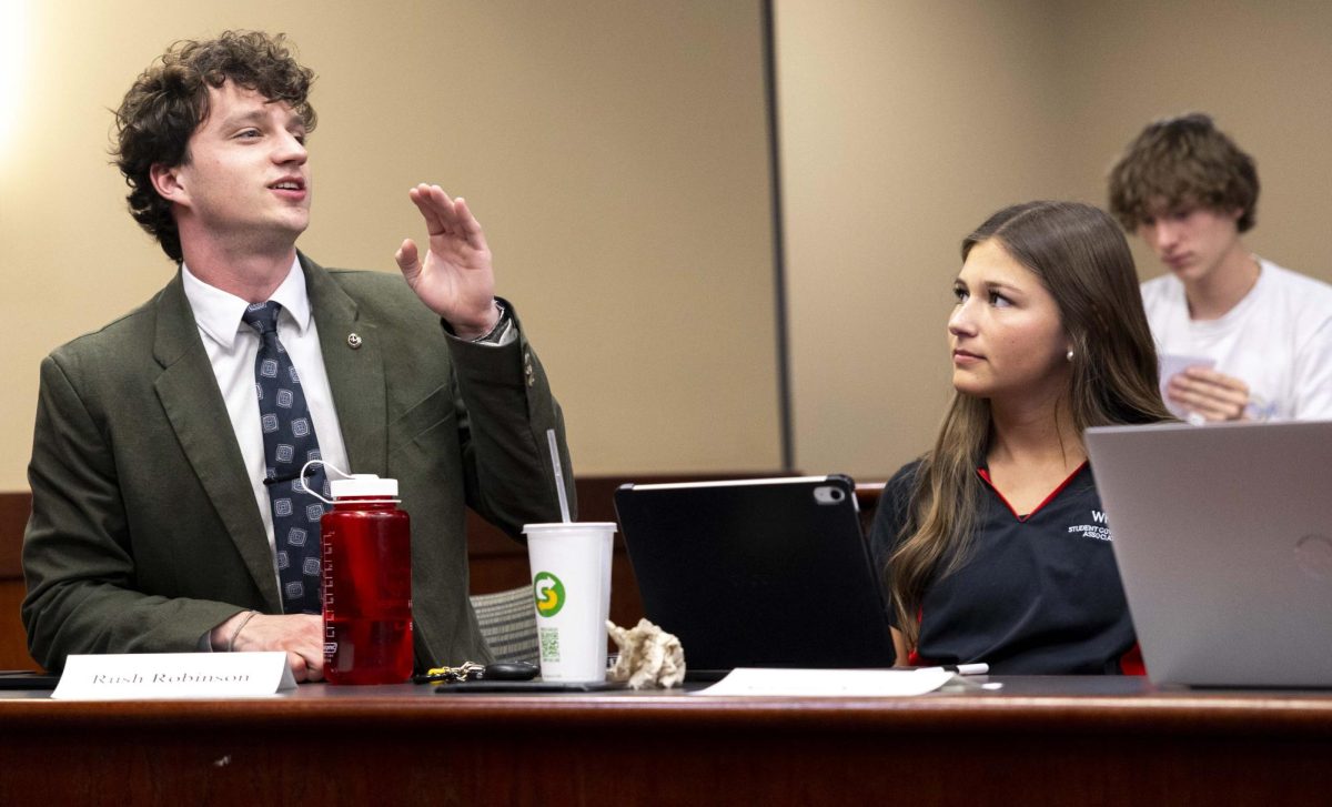 President Rush Robinson gives a reminder to wear business-casual appropriate attire for an upcoming event at the end of the weekly SGA meeting on Thursday, April 2, 2026 in Senate Chambers. Robinson said it is meeting with Caboni business casual, not SGA business casual. 