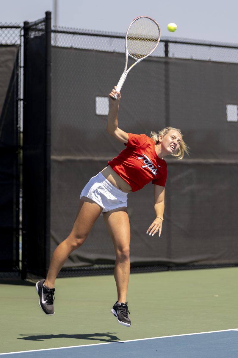 Western freshman Isabelle EIness jumps to return a ball during Western’s match against Middle Tennessee State University at the Warren County Tennis Facility at Michael O. Buchanon Park on Thursday, April 9, 2026. Coming into the match, Einess recorded nine singles wins this season, all at the No. 1 position.