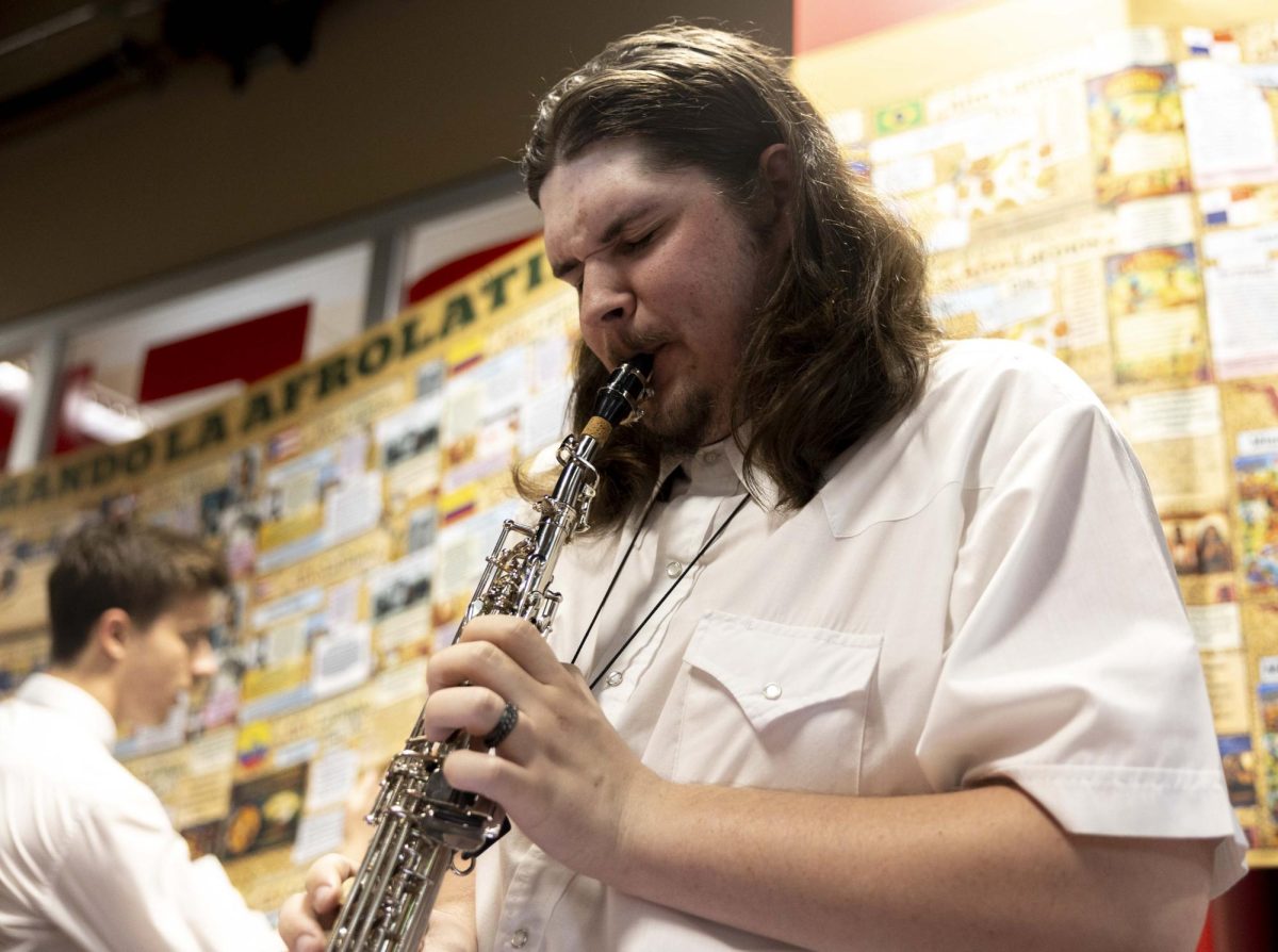 Randall Joe Brown at the Venezuelan Clairinet dr. poster plays the saxophone during Celebrado La Afrolatinidad in nite class DSU on Monday, April 13, 2026.