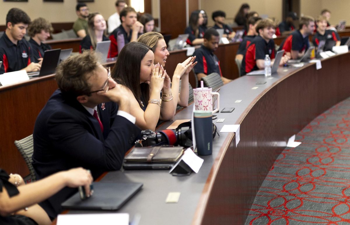 SGA members react to a bill that seeks funding for swedish massage vouchers to be available in the SGA office during the weekly SGA meeting on Tuesday, April 14, 2026 in Senate Chambers.