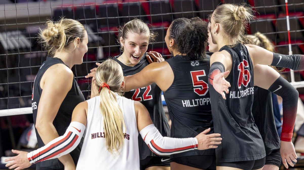 Western Kentucky Hilltoppers celebrate a point by outside hitter Faith Young (22) against Murray State University during the spring match on Saturday, April 18, 2026, at E.A. Diddle Arena. The Hilltoppers defeated the Racers 3-0 in the exhibition match.