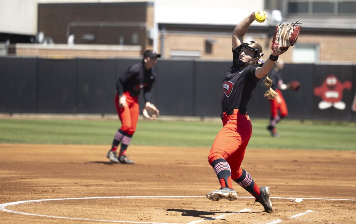 Western Kentucky University right hand pitcher Erica Houge (11) gets ready to throw pitch during the game against UTEP. WKU won the game by 8-3. 