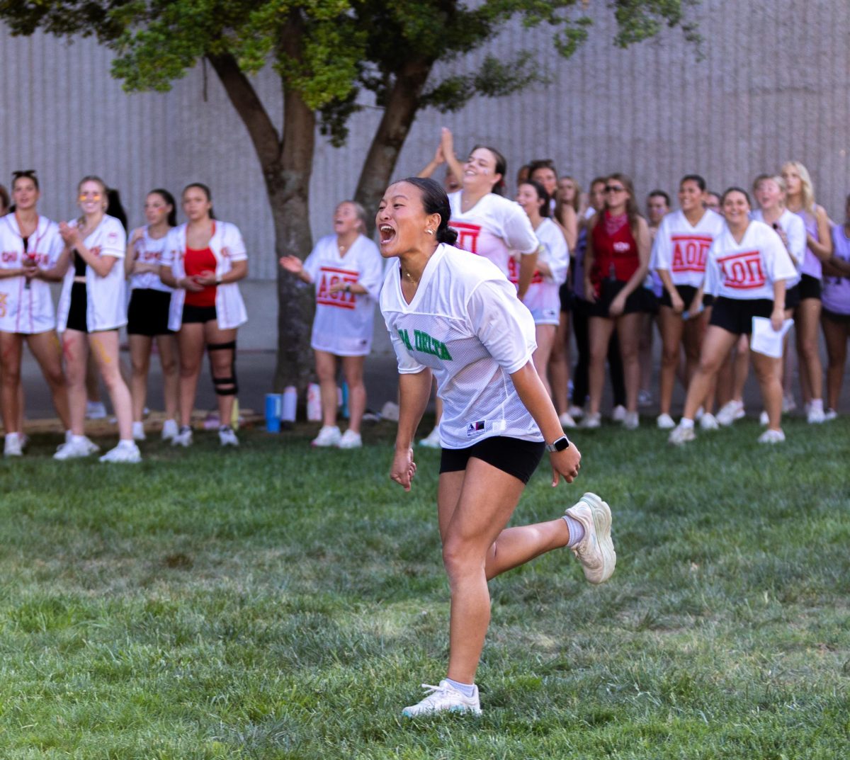 Emma Husky, a member of the Kappa Delta chapter, celebrates after winning egg toss during “Event Day” for Greek Week at The Colonnades at Western Kentucky University in Bowling Green, Ky. on April 22, 2026. Sororities and fraternities competed in five games: frisbee, relay race, log walk, egg toss and red light, green light.