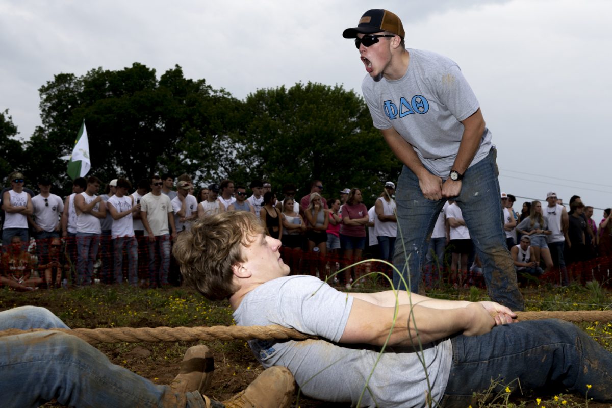 A Phi Delta Theta coach yells commands during the annual Greek Week “Tug” competition at the WKU Agricultural Research and Education Center on Friday, April 24, 2026. FDT overthrew the reigning champs Alpha Gamma Rho to take home the victory.