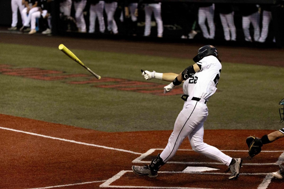 Western Kentucky University infielder Manny Alberto (22) loses his grip on his bat while making a swing on Friday, April 24, 2026 during a home game against Kennesaw State University. 