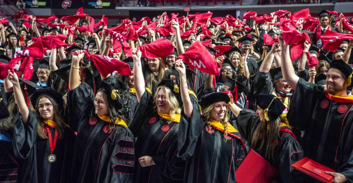 The newly graduated class of May 2026 waves their red towels for a final time at the College of Education & Behavioral Sciences Recognition Ceremony on Friday, May 8, 2026 in E.A. Diddle Arena.