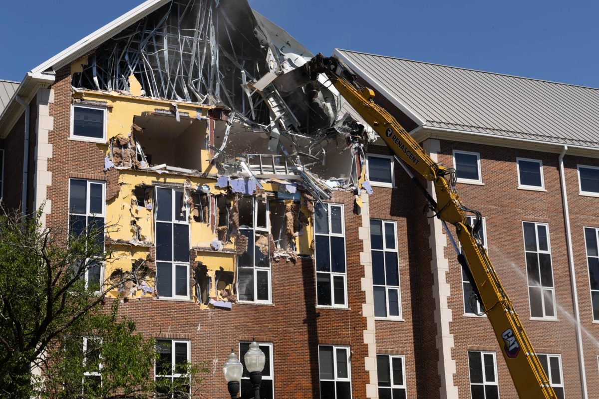 Construction workers tear down Hilltopper Hall on Tuesday, May 12, 2026 after it closed in 2024 due to structural issues. 