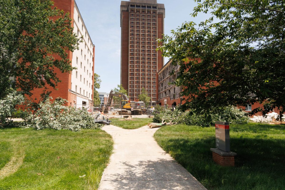 Construction equipment begins on the smaller right half of Douglas Keen on June 24, 2026, after entirely removing the lobby.